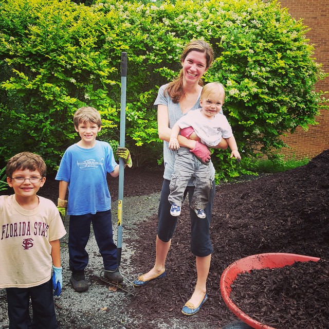 Making their Daddy's Father's Day wishes come true...a day of weeding and mulching.