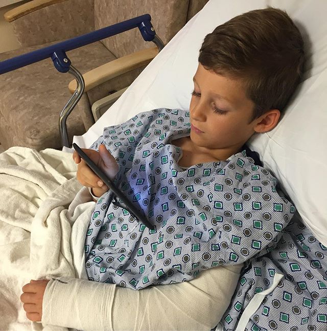 Calm, cool, and collected with his Kindle pre-op.