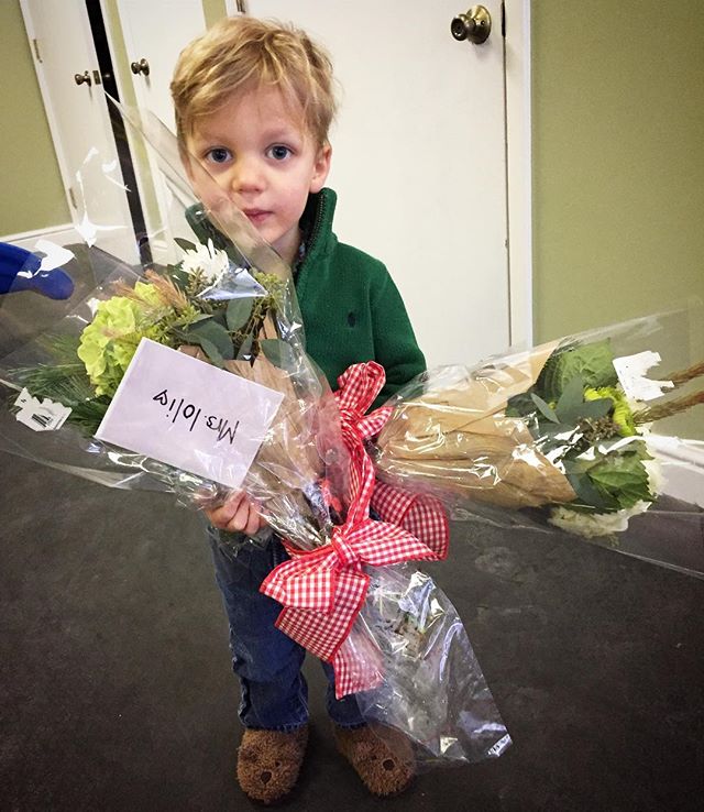 Heartbreaker giving flowers to his teachers on his last day of school before the Holiday break.