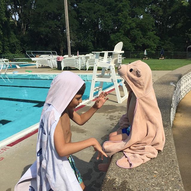 Noah giving Rainey swimming lessons