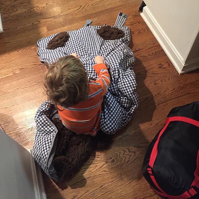 Rainey tried to pack his sleeping bag for the Campout.